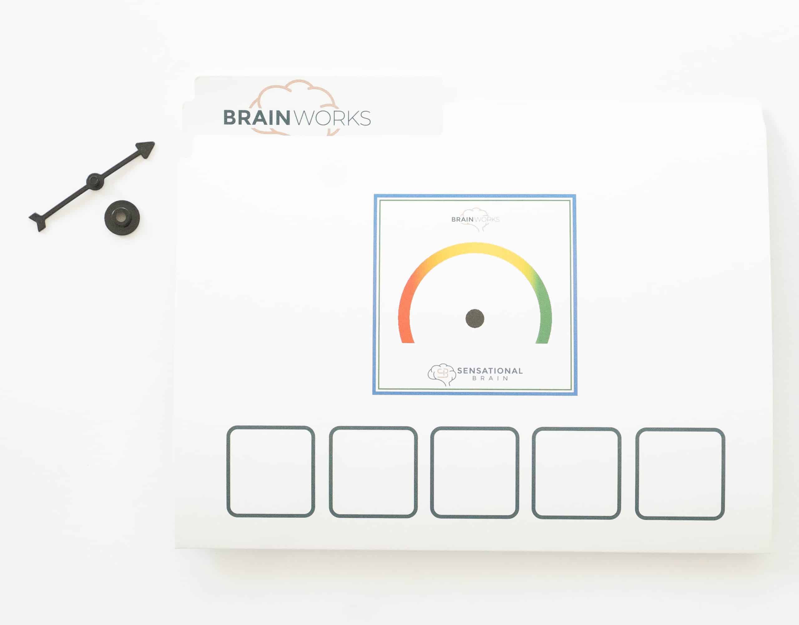 BrainWorks kit with a color gauge and an arrow piece for tracking progress, alongside labeled compartments.